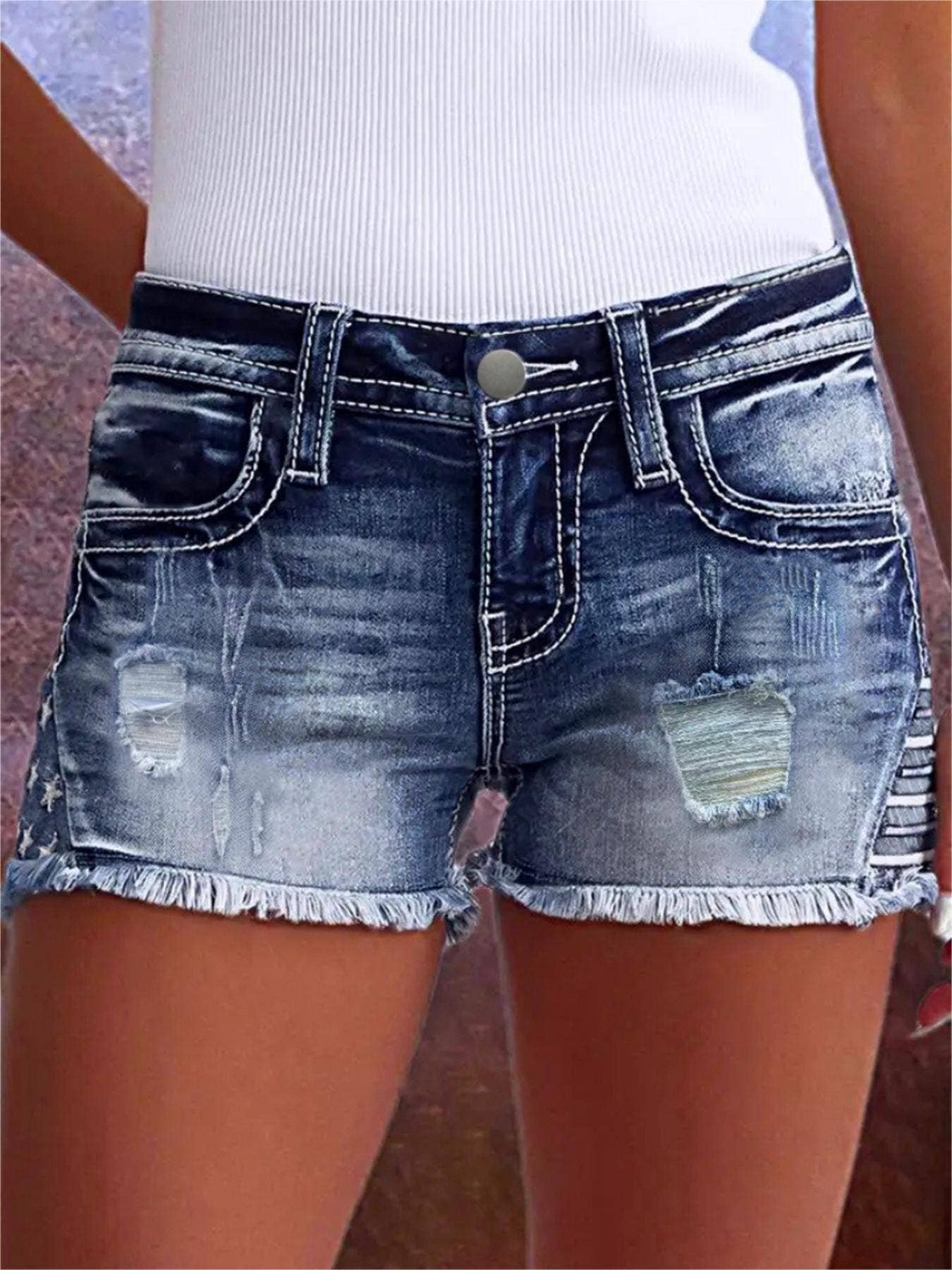 Mid rise ripped denim shorts
