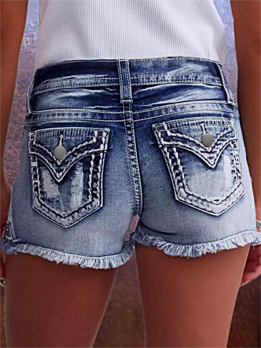 Mid rise ripped denim shorts
